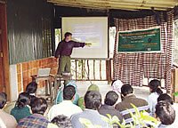 Image of Kyes teaching in a foreign country