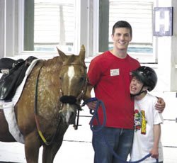 Psychology Major, Skyler Leonard with one of his students