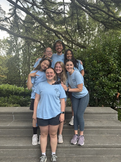 Photo of Maya Schollum and a group of other students