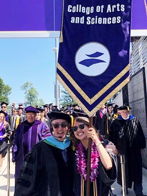 Regan Gong with Associate Vice President for Student Life Lincoln Johnson at Commencement Ceremony